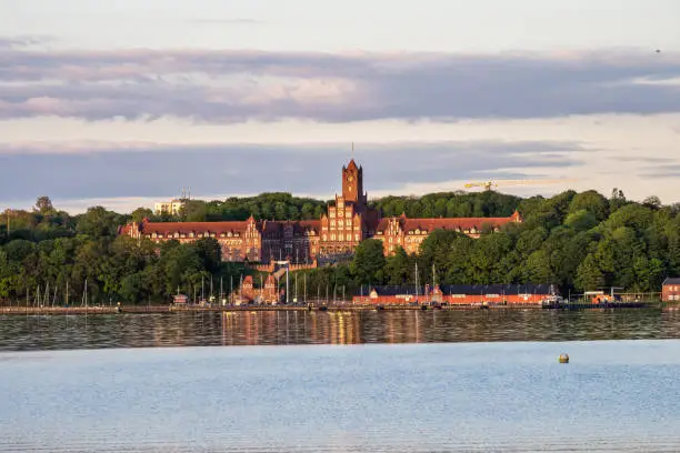 Photo of The historic building of Marine School in Flensburg at sunset. Schleswig-Holstein in Germany