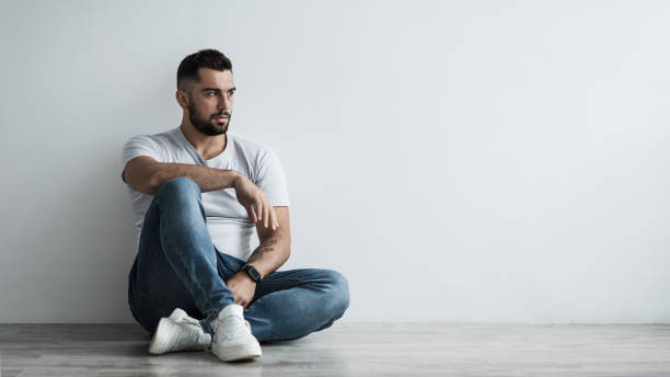 istock Lonely handsome man sad, stressed in self-isolation, suffering agoraphobia, depression 1331251121