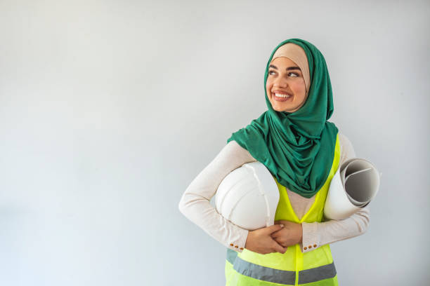 istock Female architect and engineer in hidjab and hardhat. 1331252248