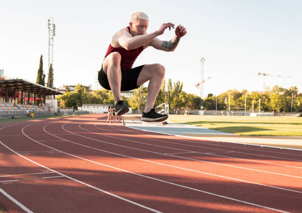 istock caucasian man athlete long jump 1331252350