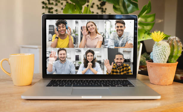 istock desk with laptop using online video chat service at workplace 1331252893