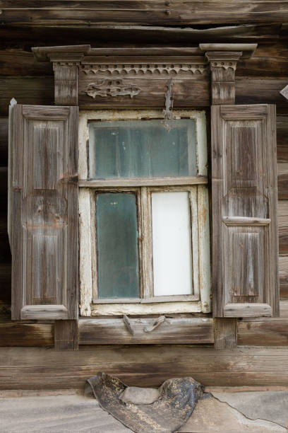 istock A beautiful old window with beautifully designed platbands window with open shutters 1331253913