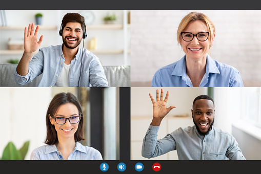 Videoconference Concept. Diverse team working remotely, having group video call, sharing ideas and brainstorming. Four multiethnic young and mature businesspeople negotiating, pc screen app view
