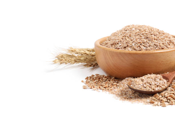 istock Wheat bran and spikelets on white background 1331256408