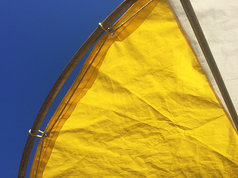 Low angle view beach umbrella with blue sky background