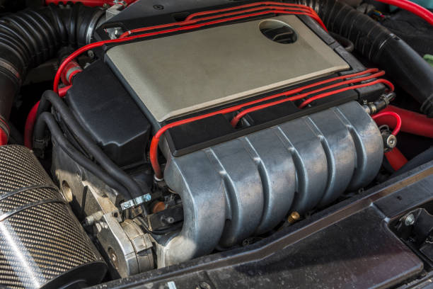 istock Open car hood. Engine and other motor parts 1331263377