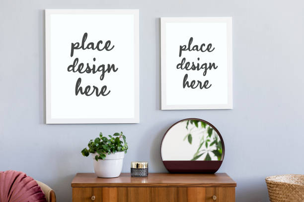 istock Creative composition of stylish hall interior with two mock up poster frames, wooden commode, plant, mirror and accessories. Hipster apartment concept, retro elements. Template. 1331263648