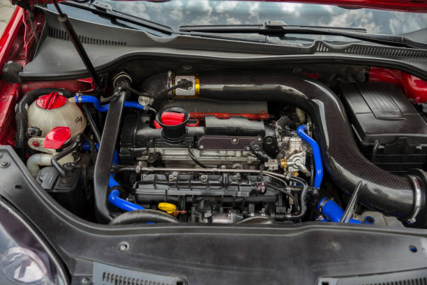 istock Open car hood. Engine and other motor parts 1331263810