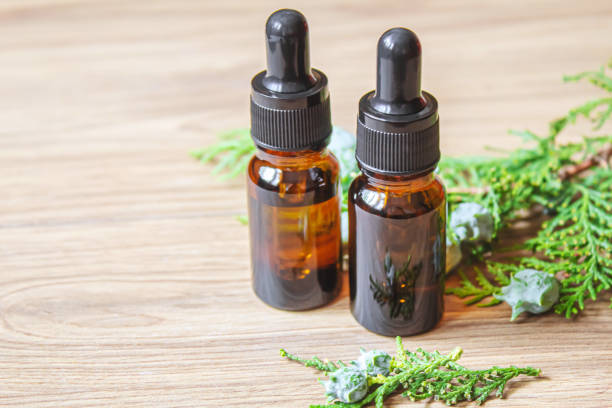 istock Juniper essential oil in a small bottle. Selective focus. 1331264906