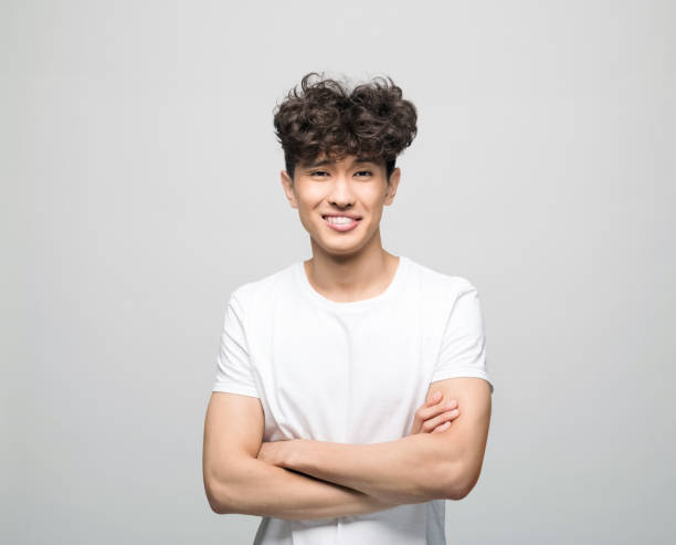 istock Cheerful young man in white t-shirt 1331266449