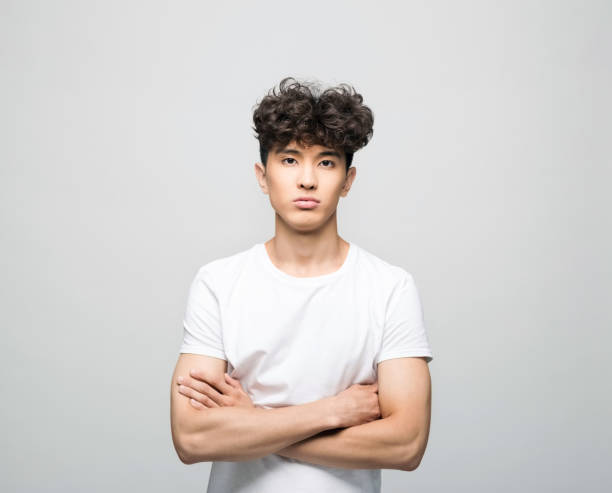 istock Confident young man in white t-shirt 1331266509