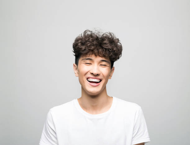 istock Headshot of happy young man 1331266927