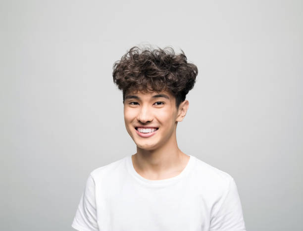 istock Headshot of happy young man 1331266989