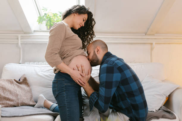 istock Beautiful young father bonding with his unborn child 1331268516