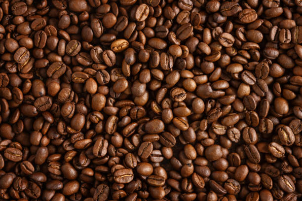 istock Closeup of coffee beans background 1331271997