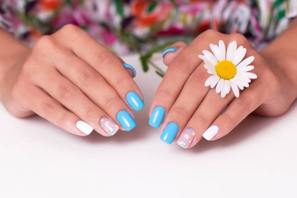 istock Female hands with summer manicure nails 1331272385