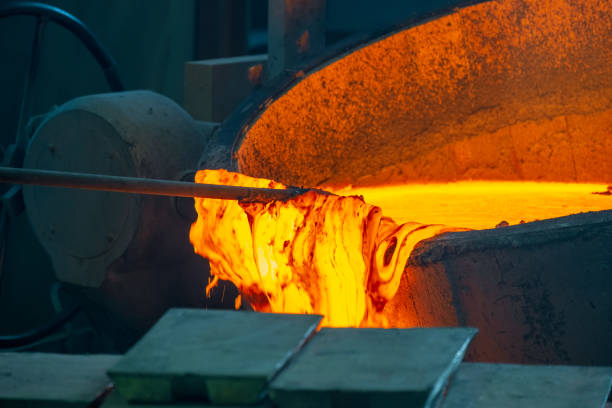 istock foundry molten metal is drawn from vat to pole 1331272492