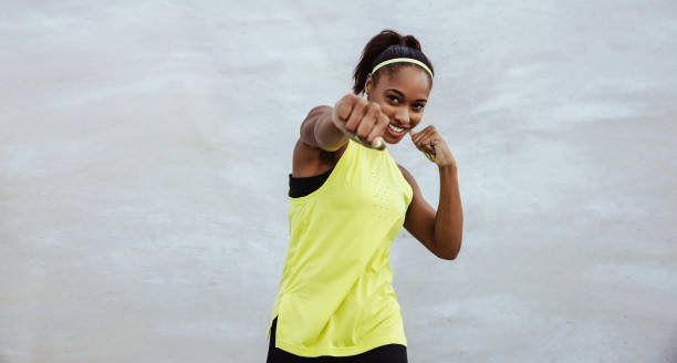 istock Fitness female doing shadow boxing exercise 1331274749