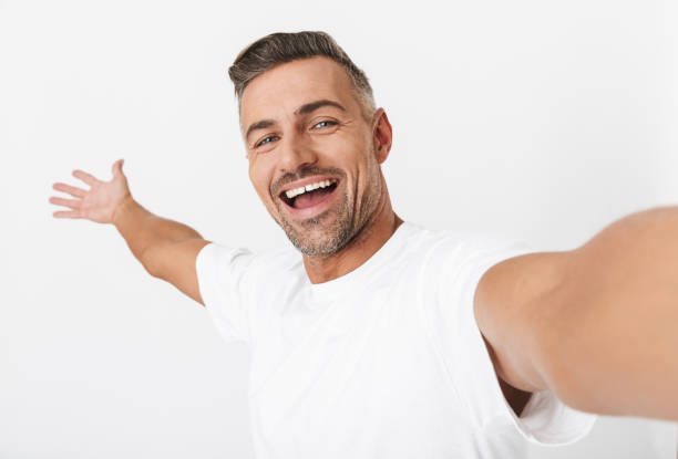 istock Confident handsome shirtless man standing isolated 1331278146
