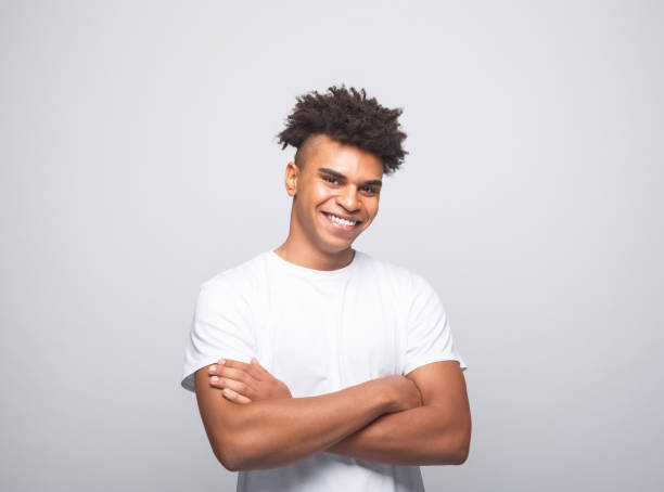 istock Cheerful young man in white t-shirt 1331278221