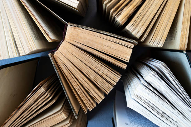 istock Old shabby thick books. View from above. 1331280062