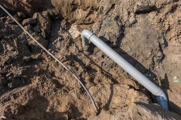 istock Plastic pipes in the ground during the construction of a building 1331280533