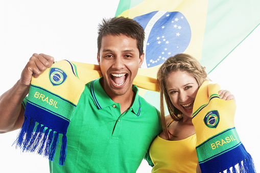 Fans of the Brazil soccer team express their joyful support.