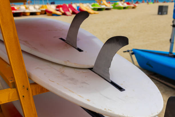 istock Surfboards stacked on the rack on a beach 1331281437