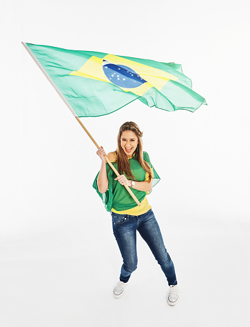 Beautiful young woman expresses her Brazilian patriotism.