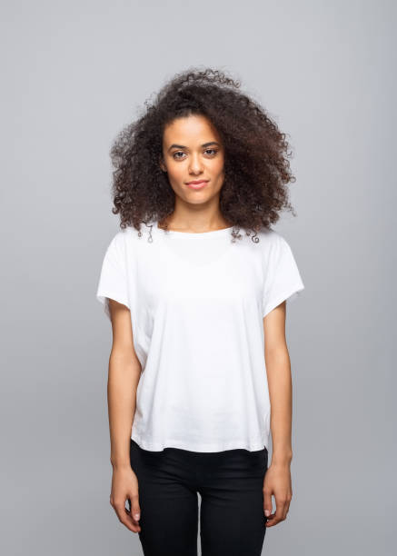 istock Friendly young woman in white t-shirt 1331283238