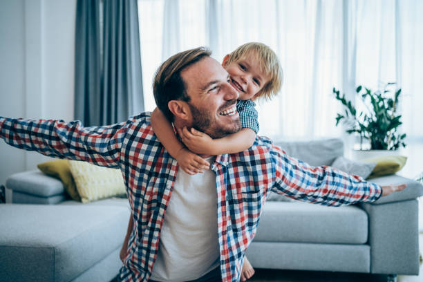 istock Father and little son at home. 1331283893