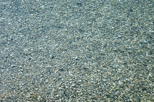 Pebbles, sea, coast, beach stock photo.