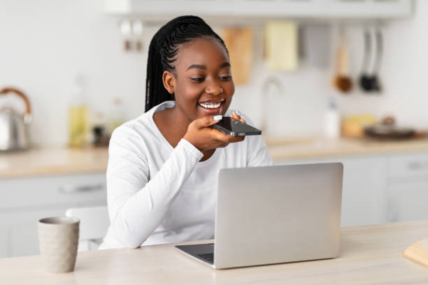 istock Woman using voice search assistant on smart phone 1331288324