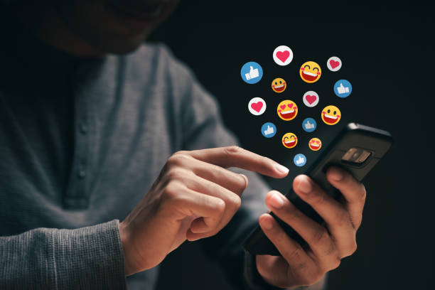 istock Happy young man using smartphone chatting on Social network sending text message. Social media, Live Streaming Concept. 1331289568