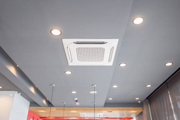 Modern ceiling mounted cassette type air conditioning system in coffee shop