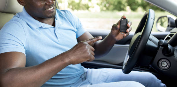 istock Unrecognizable black man showing car key, panorama 1331290729