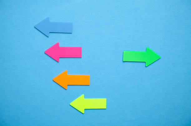 istock Colorful arrows on blue background. 1331291756