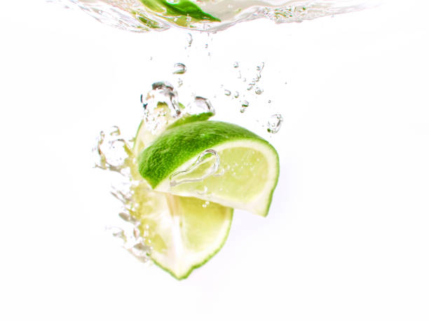 istock lime and lemon splashing water isolated on white background 1331293849