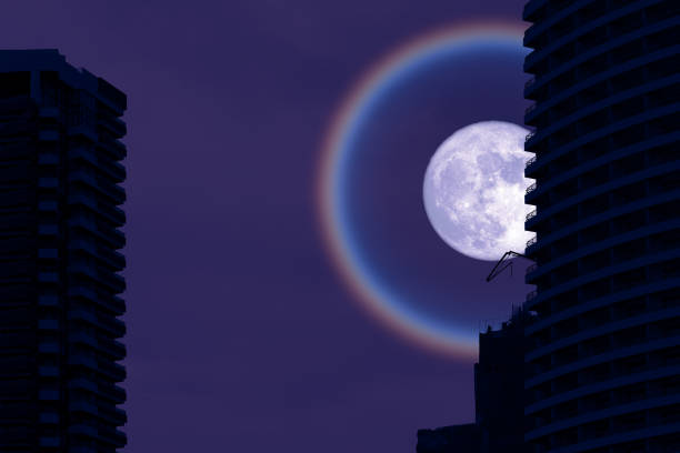 istock super fruit blue moon halo back silhouette building on the night sky 1331294550