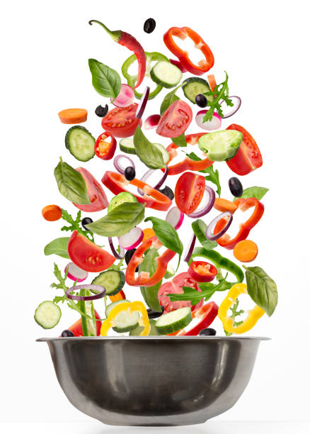 istock Fresh vegetables flying into pot, isolated on white background 1331295547