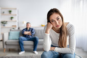 Relationship crisis. Mature woman feeling upset after fight with her husband at home, copy space