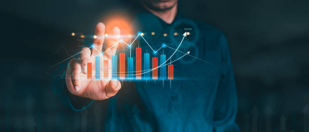 istock Money businessman touch virtual screen screen displaying a crypto currency featuring stock tickers or graphs. Stock trading platform concept. professional financial. Stock market data candlesticks. 1331297559