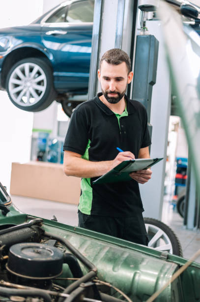 istock Mechanic using Diagnostic machine tools for car stock photo 1331297580