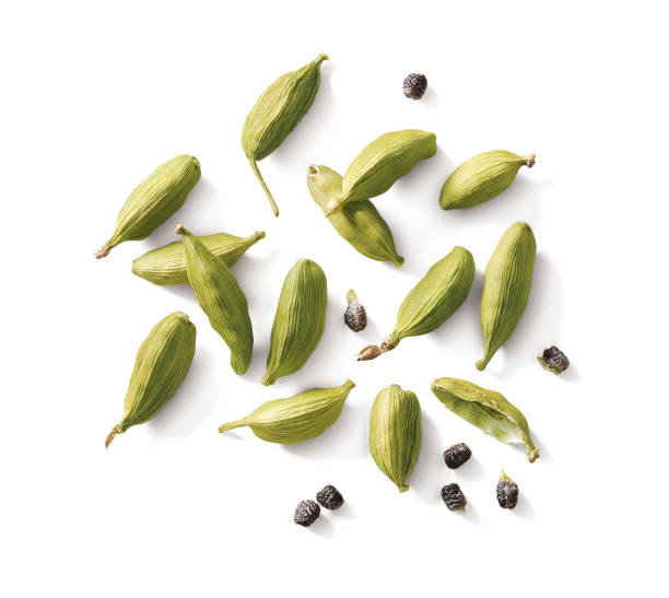 istock Cardamom pods and seeds isolated on white background. 1331297733
