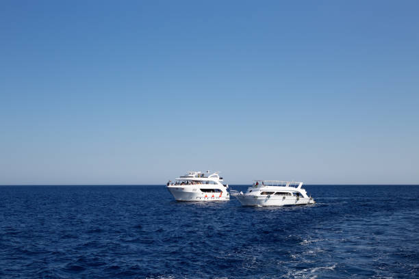 istock Two pleasure yachts at sea 1331297902