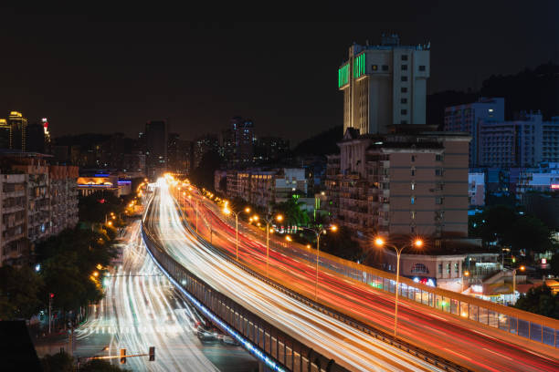 istock Night view of traffic flow on urban viaduct 1331297990