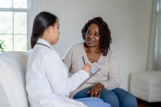 istock Doctor conducts home visit 1331298194
