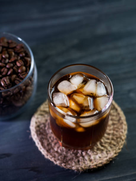 istock cold brew coffee with ice cubes on a black table close-up 1331299617