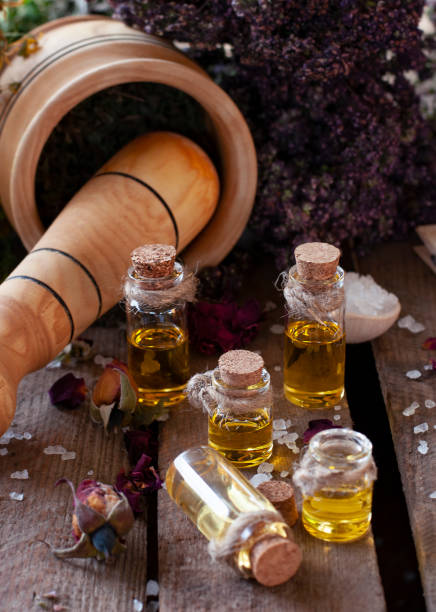 istock Essential oil bottles with dry ingredients 1331299718