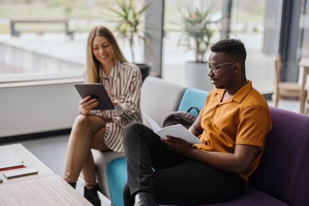istock University students chatting while waiting for lectures to begin 1331299958